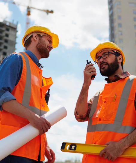 A couple of contractors standing opposite each other